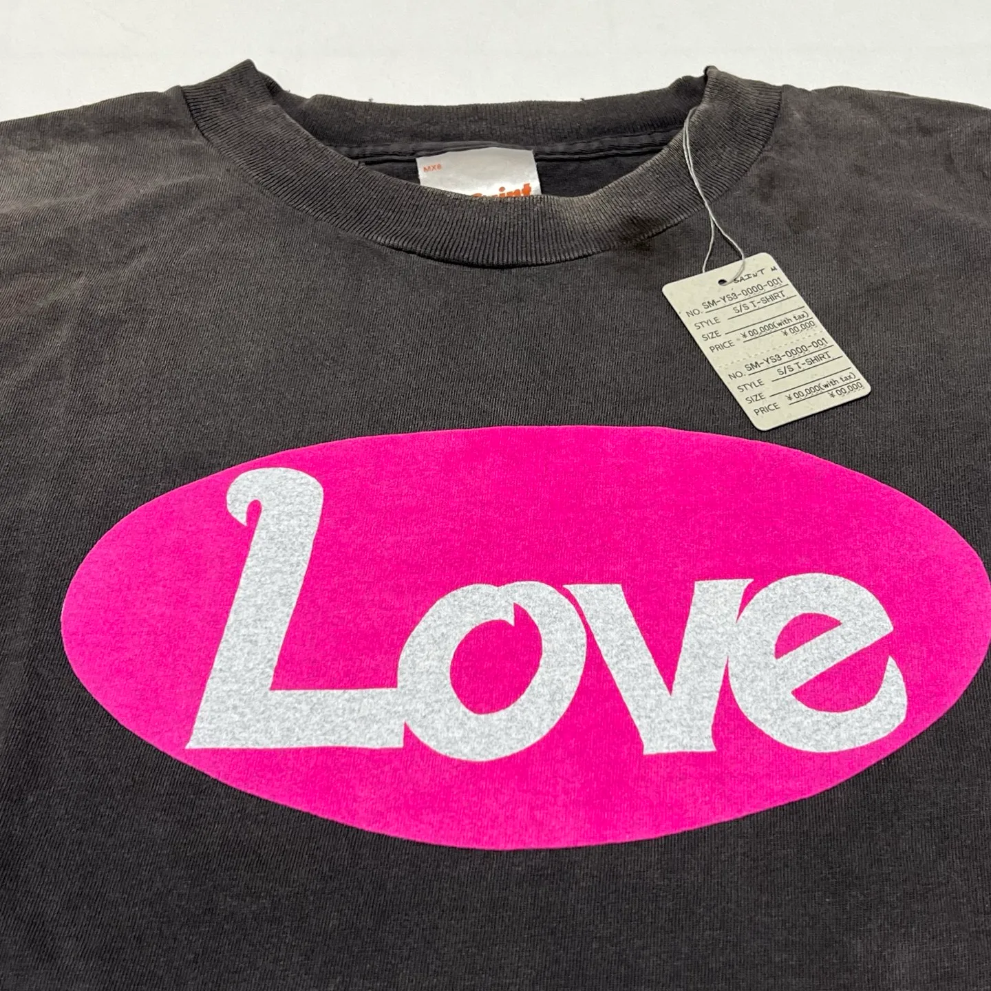 SAINT Mxxxxxx SS TEE/LOVE/BLK LOVE Pink Love Skull Distressed TEE Washed Black S-XL Cylindrical Fabric Ready-made Assute Dyeing Ma Liu Fading Washing Technology Top Printing Technology Handmade Graffiti Splashing Ink Correct Main Mark/Wash Mark/Anti-Counterfeiting Label Top Purchasing Level